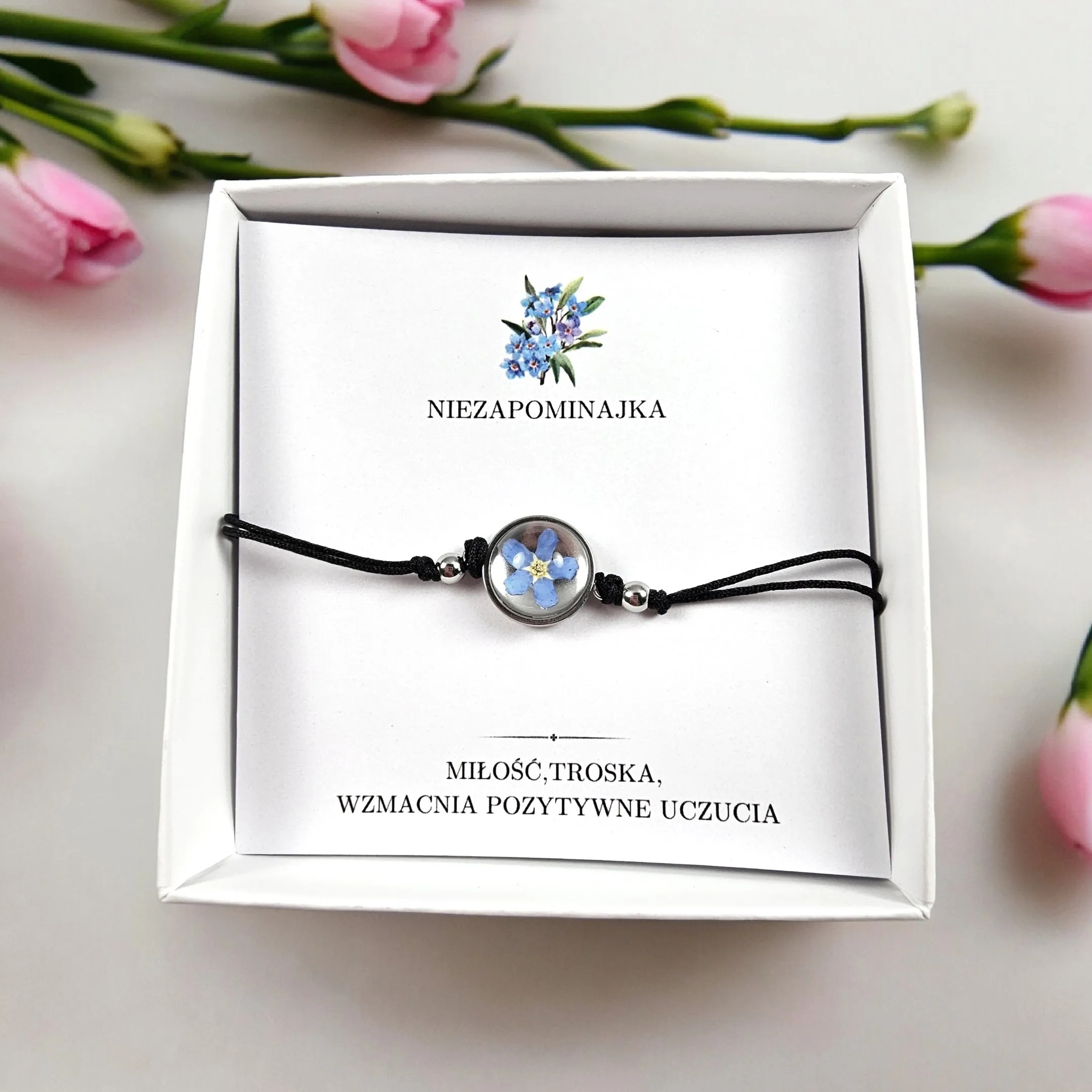 BRANSOLETKA Z NIEZAPOMINAJKĄ NA RZEMYKU OKRĄGŁA CZARNA